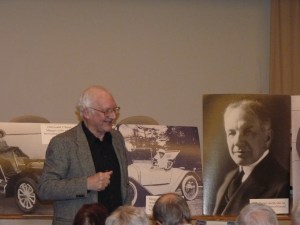 Paul Arculus, and the gentleman in the photograph, far right, is William Durant, the founder of GM